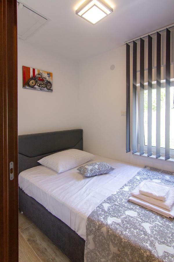 Apartments Edi & Tea Малинска Экстерьер фото